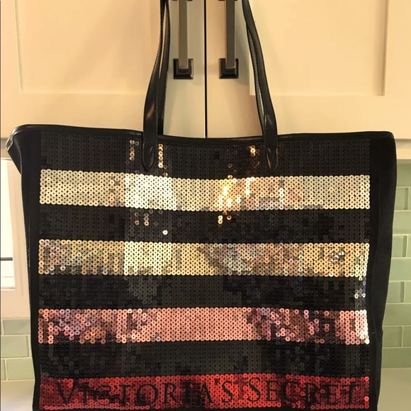 Victoria's Secret Accessories - Victoria’s Secret weekender bag sequins striped